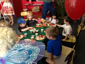 Young 3 year-old students enrolled in our Music Wonderland Course enjoy a tea party hosted by the Music Fairy. 