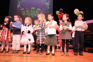 JMC students singing and dancing "Samba Kings" at All-School Concert