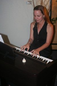 Adult Student performs at Keyboard Encounters Adult Piano Class Party. 