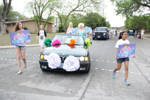 The Music Fairy and Elsa sang their hearts out in the parade atop a convertible in the Castle Hills Fiesta Parade. 