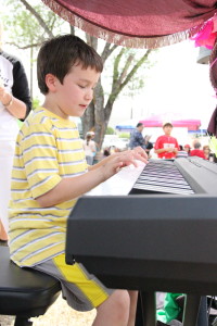 Jensen's Yamaha Student performing at our booth at the Castle Hills Fiesta Parade and Festival. 